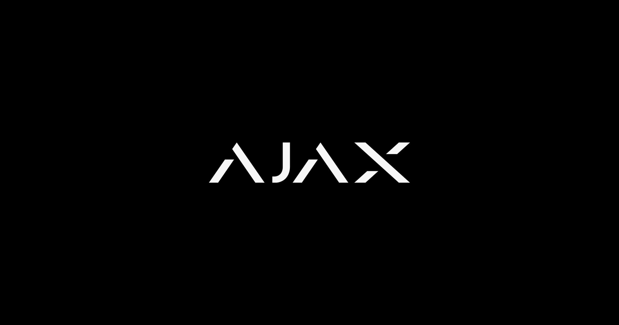 White geometric lettering spelling AJAX centered against a stark, solid black background.